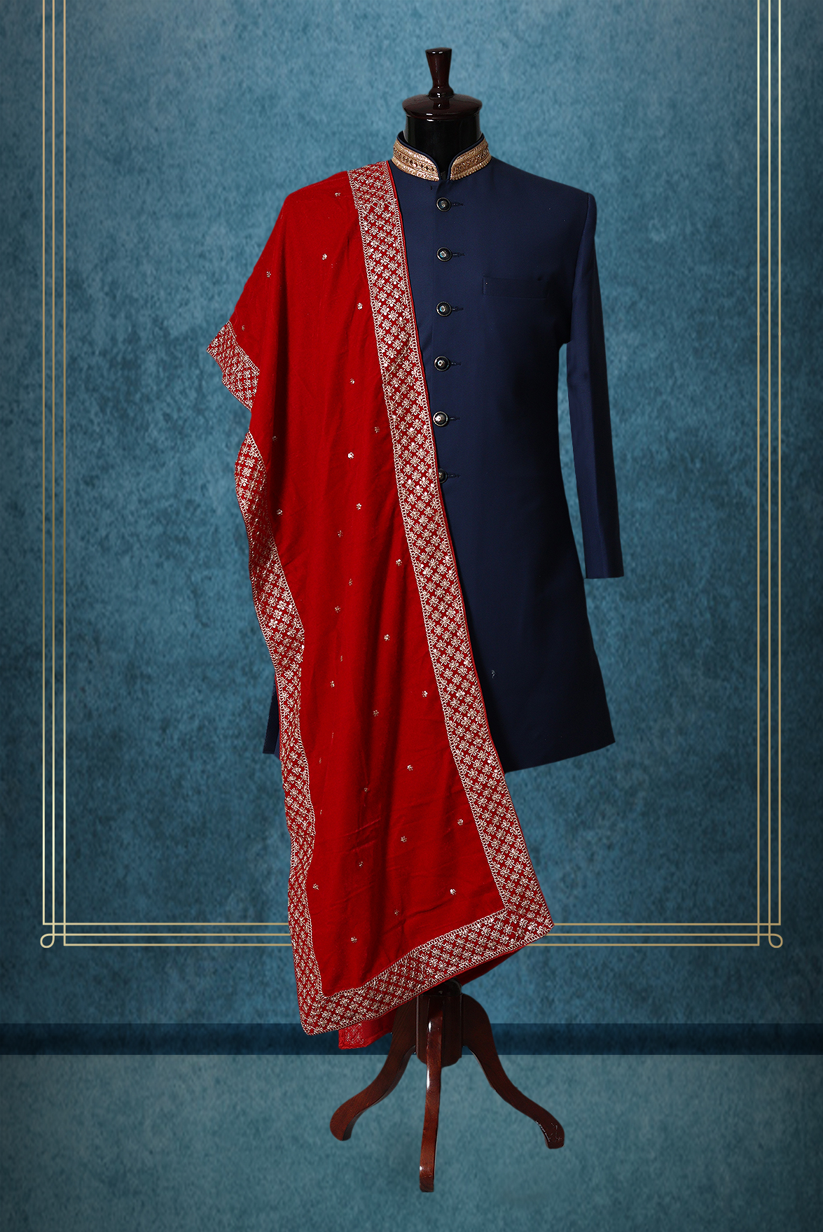Saffron Red Elegant Grooms Sherwani With Golden Border Details