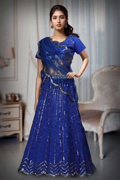 Navy Blue Faux Lehenga With Heavy Sequins And A Well Detailed Border Which Comes With A Detailed Blouse And Dupatta