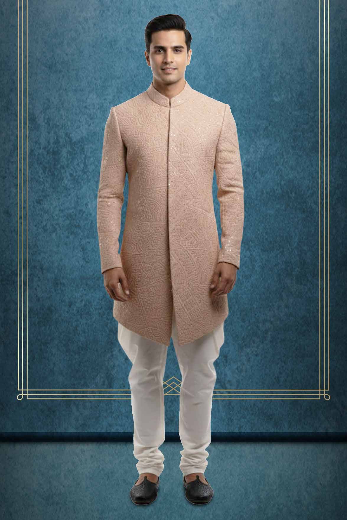 Oyster Pink Grooms Sherwani With Elegant Threadwork Details Along With Stone Embellished Buttons