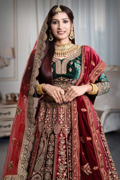 Red and green velvet heavy work lehenga