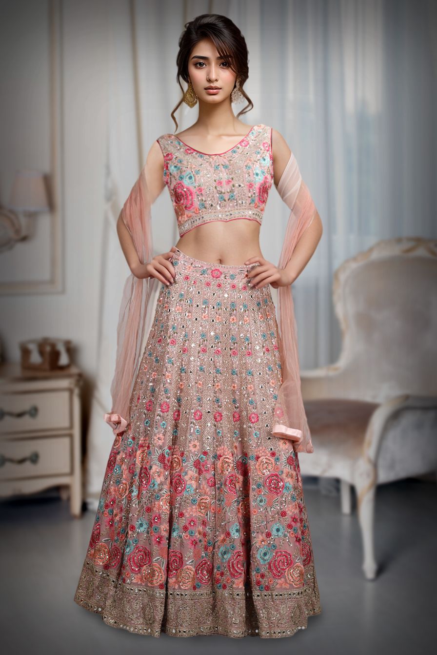 Pink Georgette Lehenga With Heavy Floral Embellishment And Sequin Work That Comes With A Heavy Detailed Blouse And Minimal Dupatta